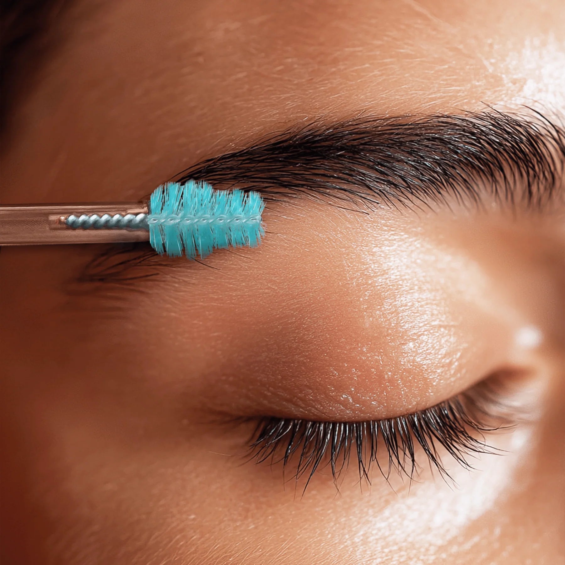 woman applying SugarBear Pro's serum for thicker-looking eyebrows SugarbearPRO®