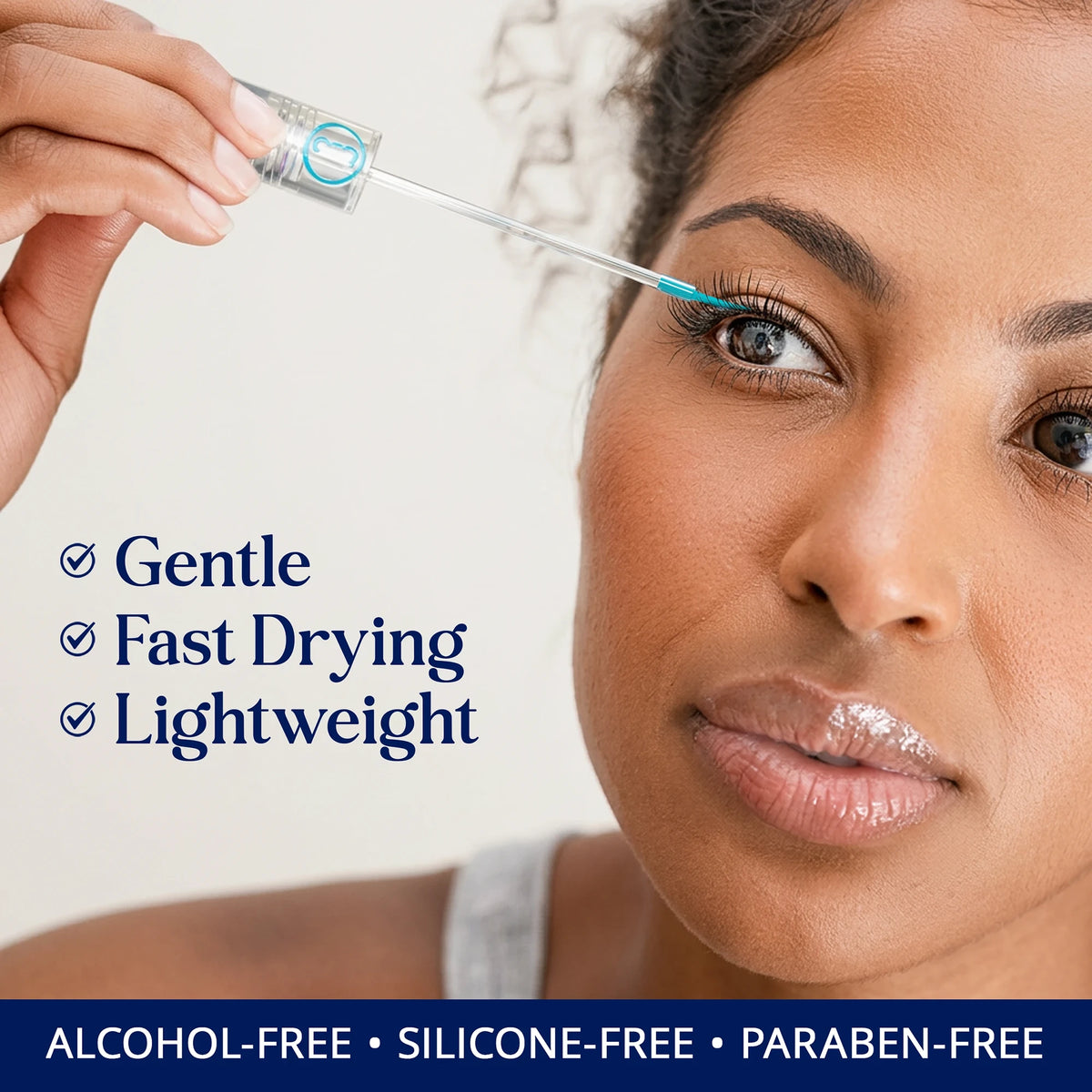 Woman applying SugarbearPRO LashCare Serum to her lashes with a gentle, fast-drying, lightweight formula that is alcohol-free, silicone-free, and paraben-free.